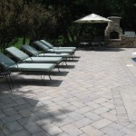 Poolscape with Lawn Chair Outdoor Kitchen